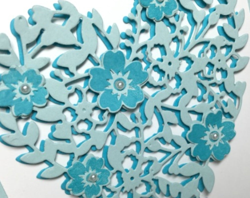 Stansmes Hart met bloem